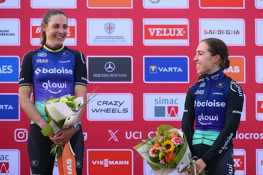 Dutch Lucinda Brand and Dutch Shirin van Anrooij pictured on the podium after the women&#039;s elite race of the Cyclocross World Cup, in Terralba, Sardinia, Italy, Sunday 07 December 2025, stage 3 (out of 12) in the World Cup of the 2026-2027 season. BELGA PHOTO DAVID PINTENS (Photo by DAVID PINTENS / BELGA MAG / Belga via AFP)