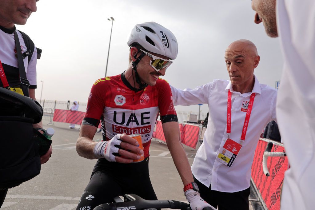 UAE Team Emirates&#039; Australian cyclist Jay Vine reacts at the finish line of the last stage of the 6th UAE Cycling Tour in Al-Ain on February 25, 2024. (Photo by Giuseppe CACACE / AFP)