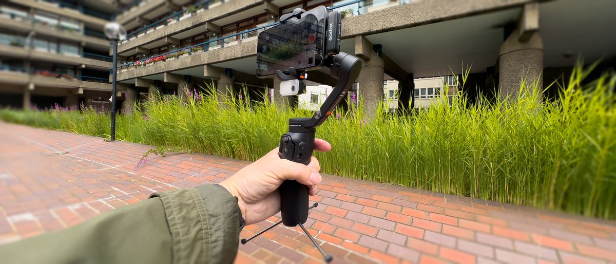 Hohem iSteady V3 gimbal held in a hand