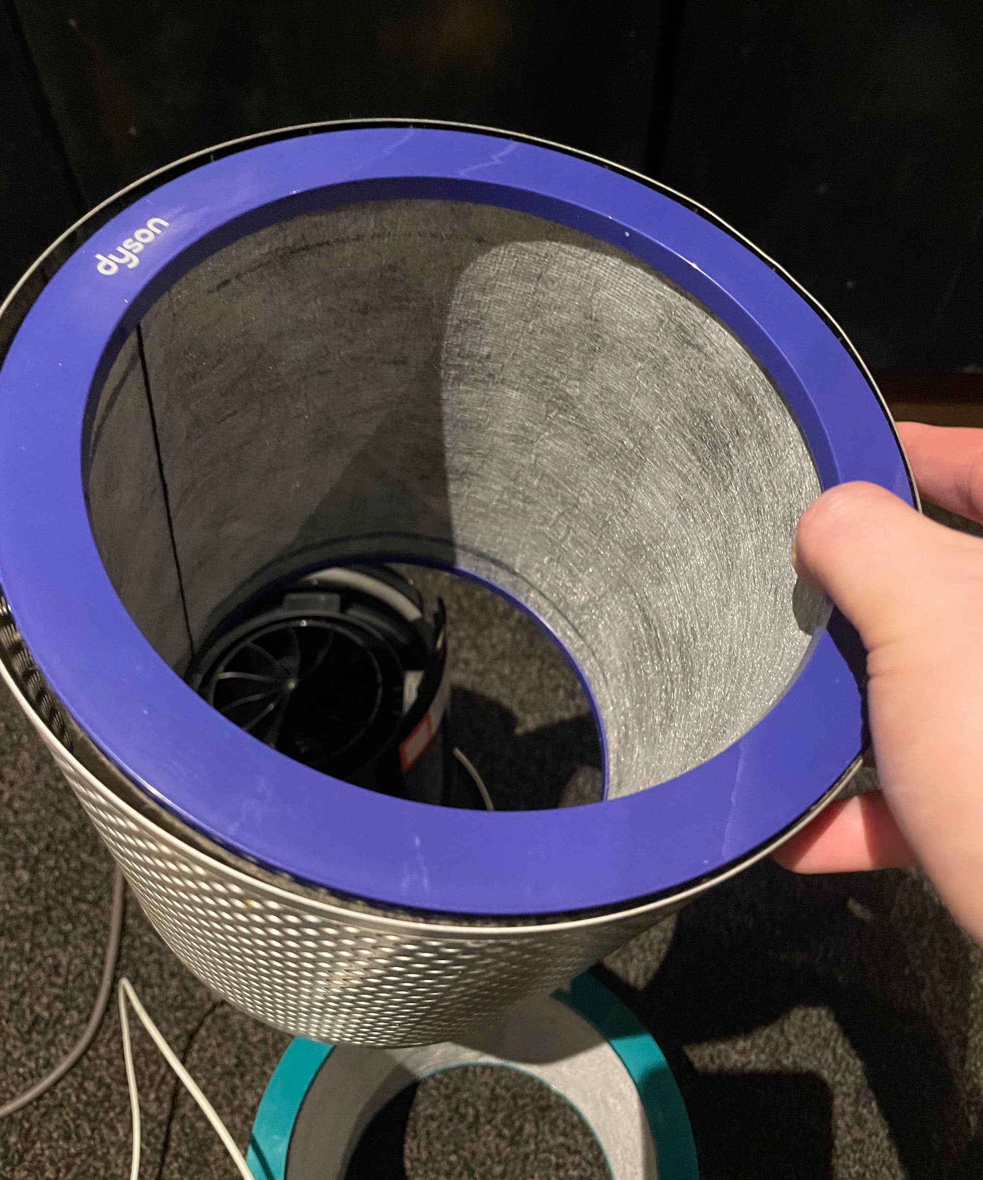 A filter for a Dyson air purifier being replaced