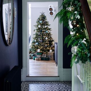 blue hallway with christmas tree