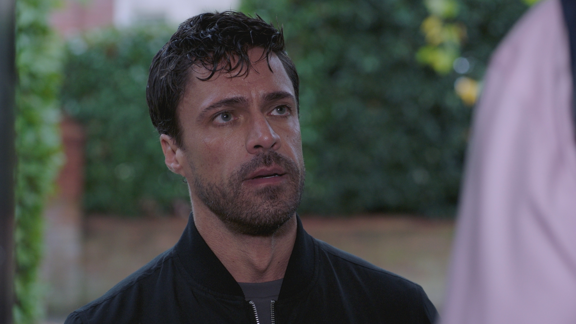 Flynn standing on Russell's doorstep looking for his estranged wife Claire.