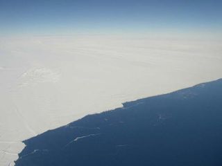 This is an aerial, close-up view of the floating section and ice front of Pine Island glacier, November 2002.