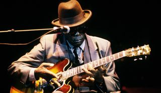 John Lee Hooker performs onstage