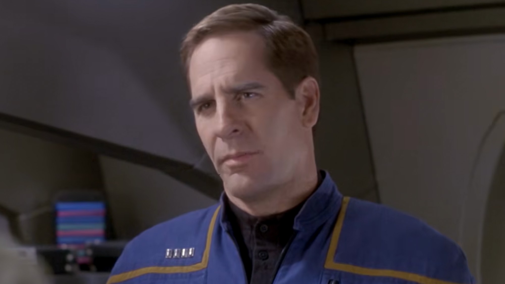Archer staring at a diplomat in Star Trek: Enterprise. 