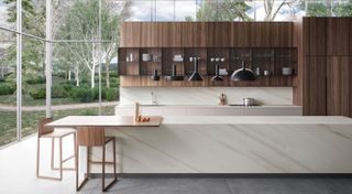 waterfall countertop made from white quartz in a modern kitchen