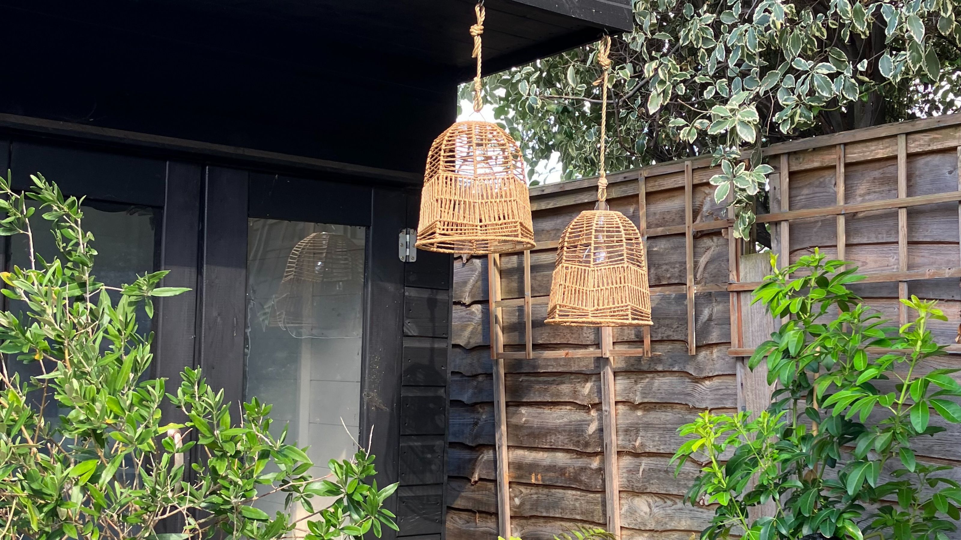 two outdoor woven hanging lights