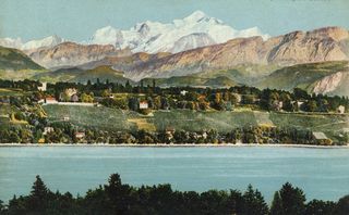 This vintage postcard from circa 1900 shows Villa Diodati (the white house with the orange roof, just left of center) on a steep slope overlooking Lake Geneva. This location allows relatively clear views to the west, but the eastern sky is partially blocked by the hill.