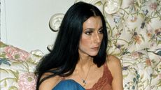 cher on her floral sofa
