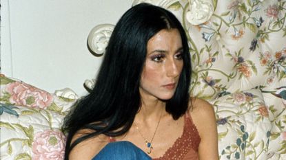 cher on her floral sofa