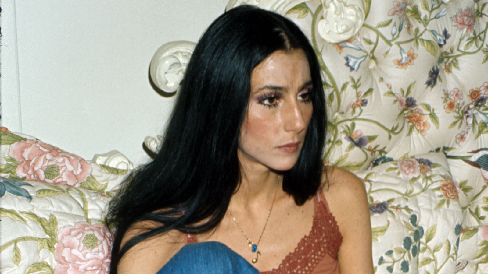 cher on her floral sofa