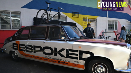 A custom painted Bespoked car with a flat bar singlespeed bike on it's roof