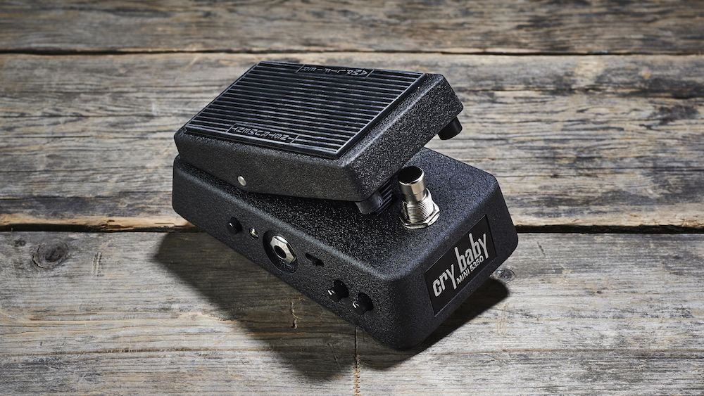 A Dunlop Cry Baby mini wah pedal on a wooden floor