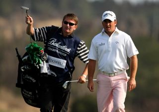 Graeme McDowell and Ken Comboy during the third round of the 2008 Ballantine's Championship in South Korea