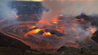 Lava and smoke coming out of a volcano