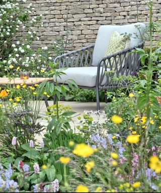 flowerbeds and garden chair