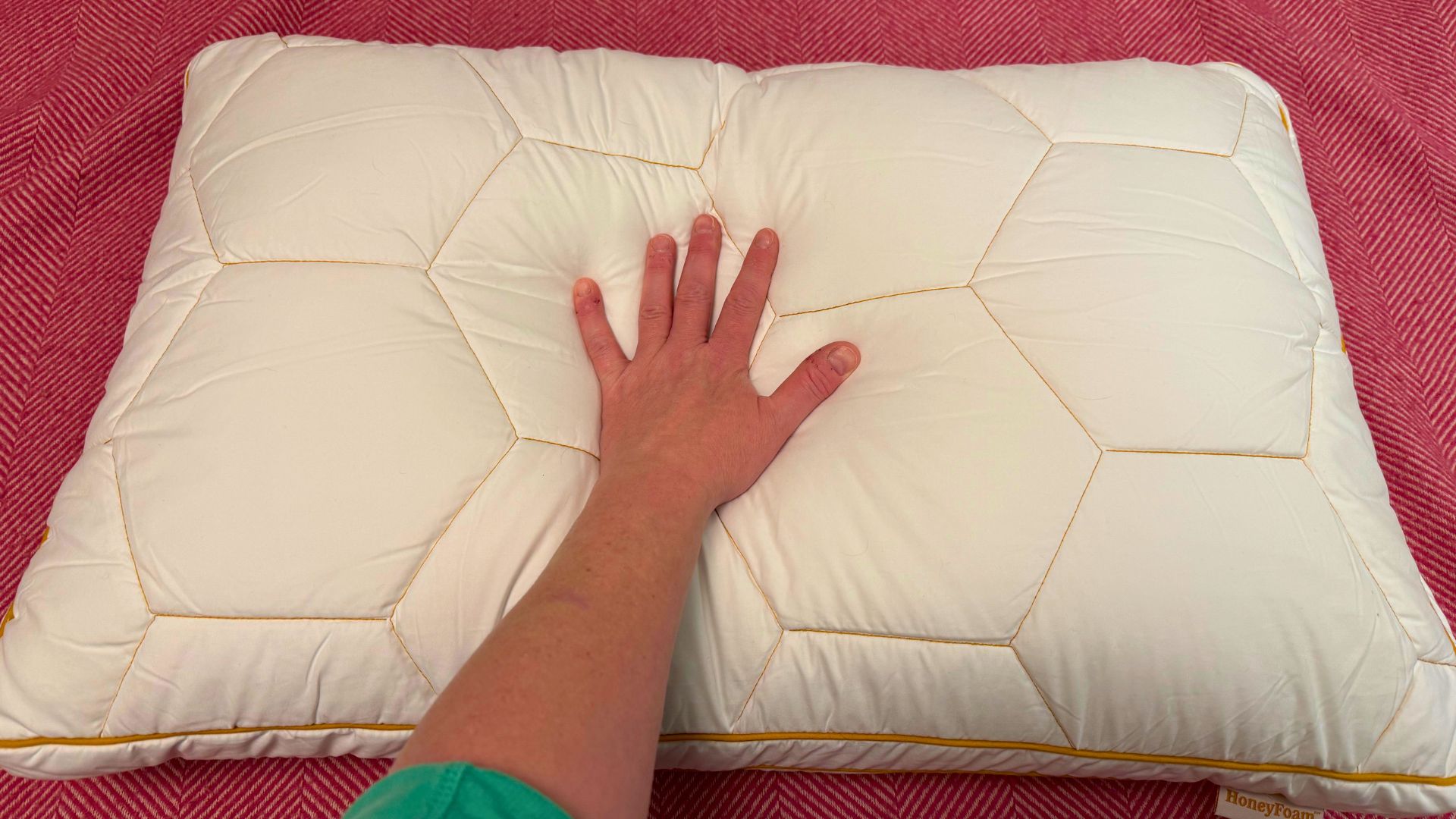 HoneyFoam&amp;trade; Adjustable Pillow Review - the tester's hand resting on the pillow