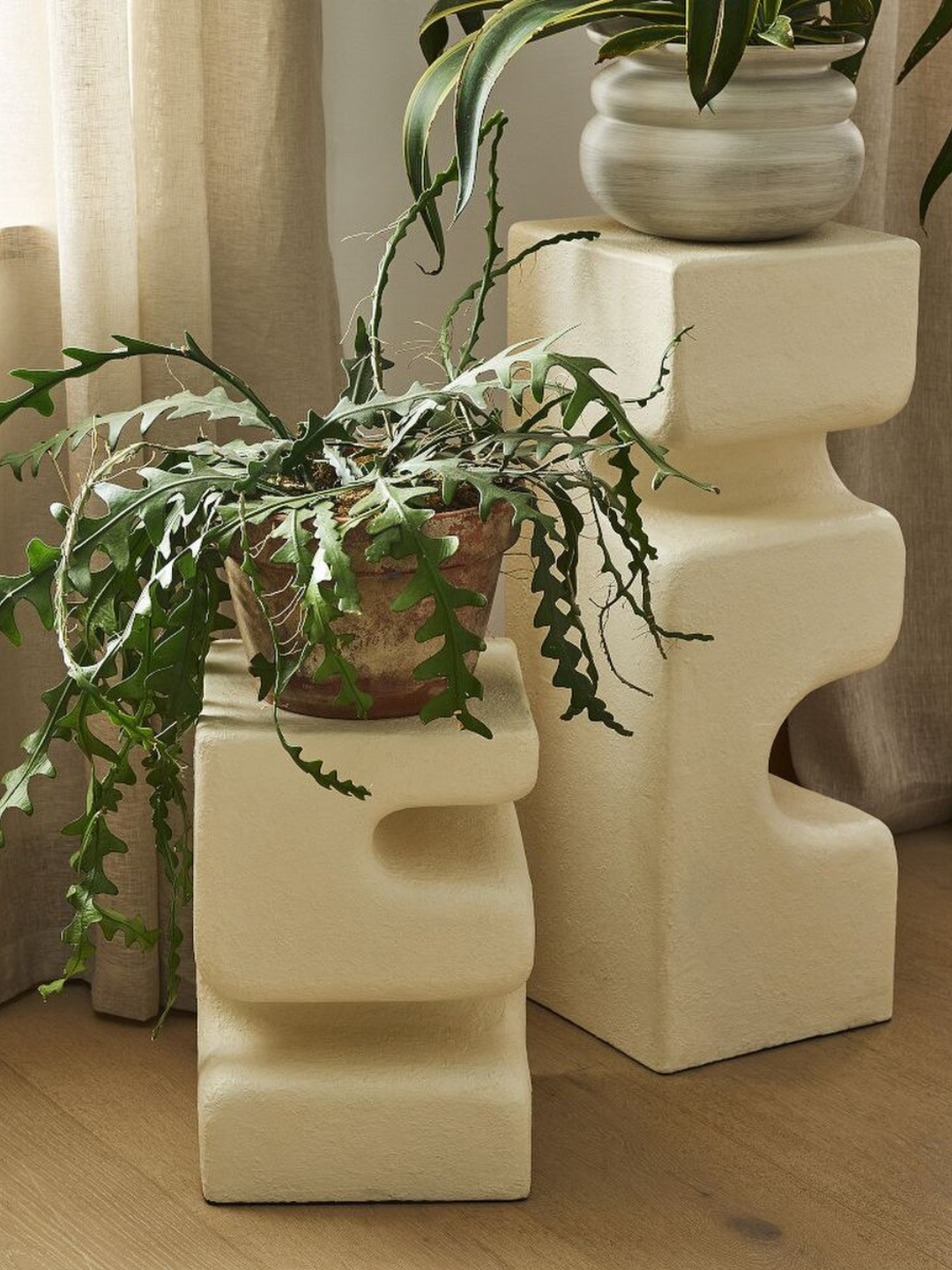 A set of textured plant stands