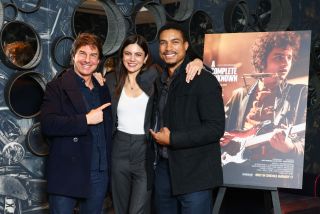 LONDON, ENGLAND - DECEMBER 17: Tom Cruise, Monica Barbaro and Greg Tarzan Davis attend the UK Awards Screening of Searchlight Pictures' "A Complete Unknown" at Ham Yard Hotel on December 17, 2024 in London, England.