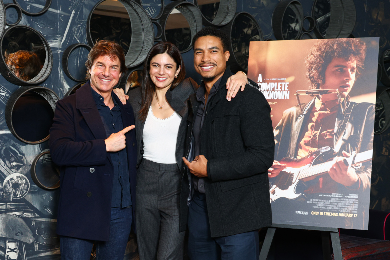 LONDON, ENGLAND - DECEMBER 17: Tom Cruise, Monica Barbaro and Greg Tarzan Davis attend the UK Awards Screening of Searchlight Pictures' 