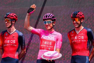 Overall leader INEOS Grenadierss British rider Geraint Thomas C waves while holding a birthday cake celebrating his 37th birthday during the presentation of the teams prior to the eighteenth stage of the Giro dItalia 2023 cycling race 161 km between Oderzo and Val di Zoldo on May 25 2023 Photo by Luca Bettini AFP Photo by LUCA BETTINIAFP via Getty Images