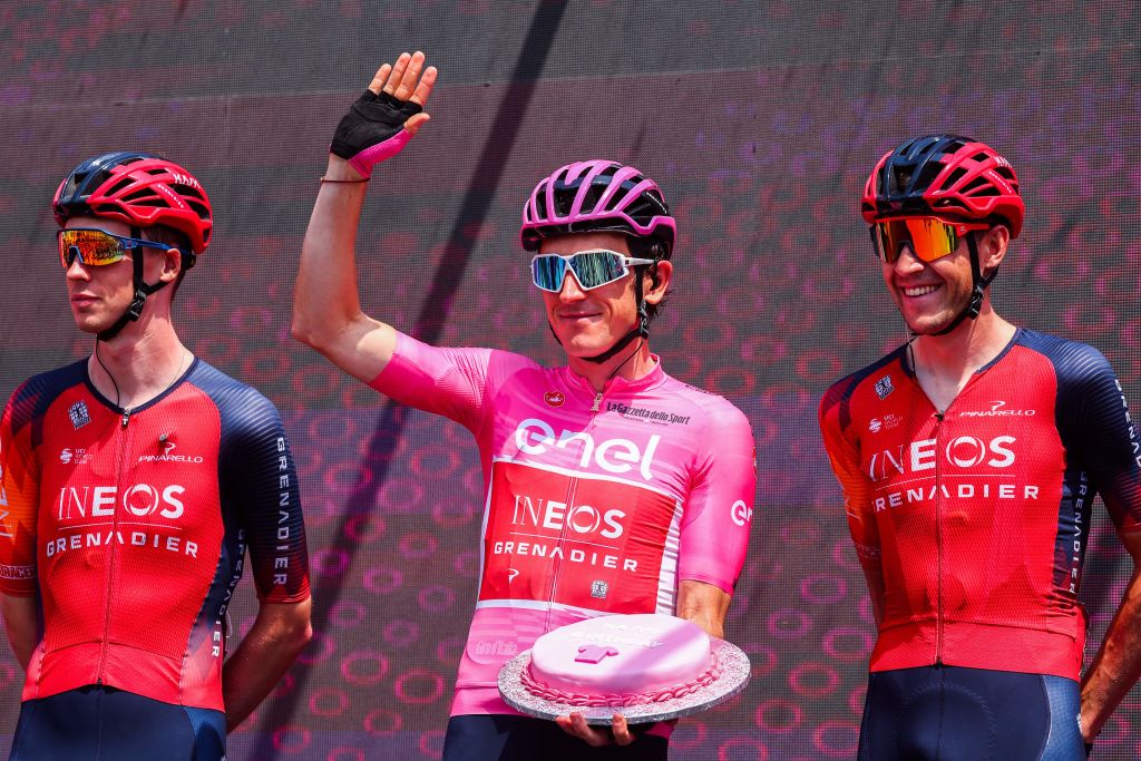 Overall leader INEOS Grenadierss British rider Geraint Thomas C waves while holding a birthday cake celebrating his 37th birthday during the presentation of the teams prior to the eighteenth stage of the Giro dItalia 2023 cycling race 161 km between Oderzo and Val di Zoldo on May 25 2023 Photo by Luca Bettini AFP Photo by LUCA BETTINIAFP via Getty Images