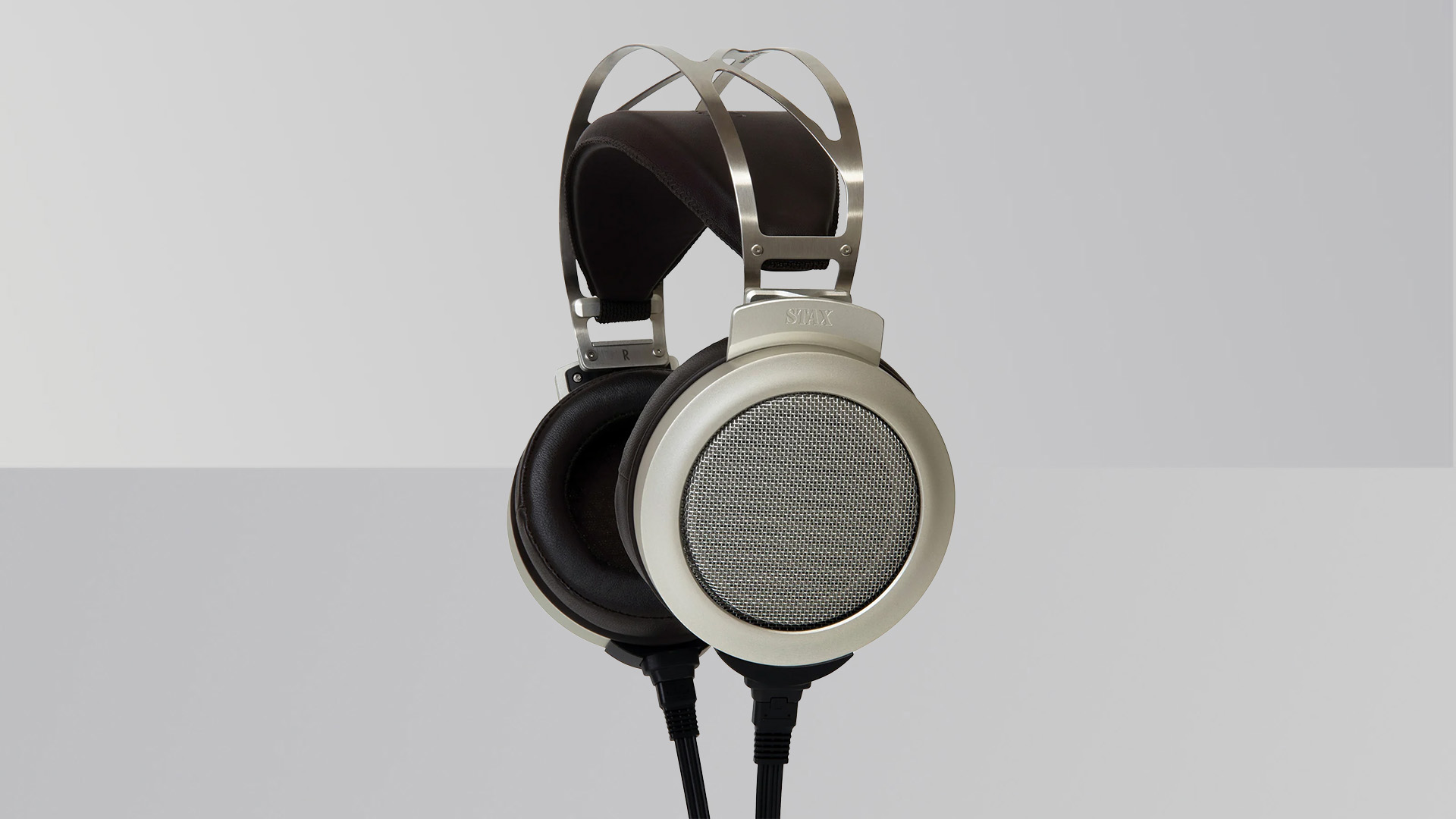 Stax SR-007s earspeakers (headphones) on a grey T3 background