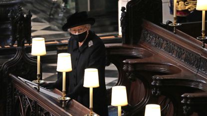 The Queen sits alone during Prince Philip's funeral