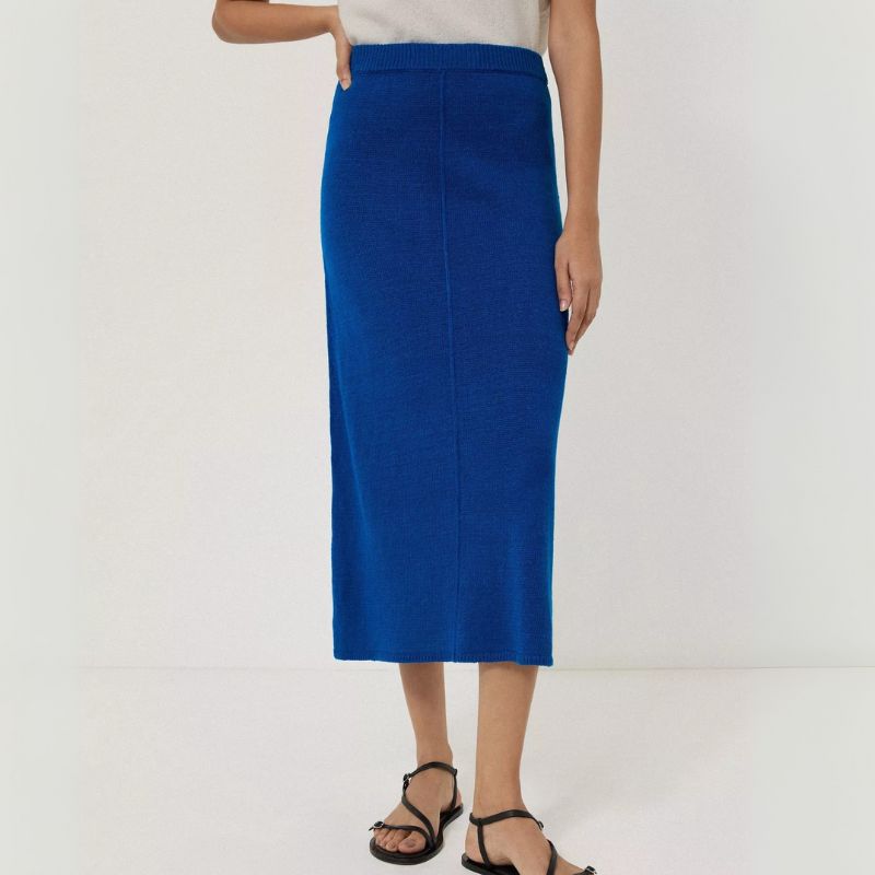 A model wears a Jigsaw blue pencil skirt