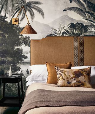 Small bedroom with black and white tropical mural