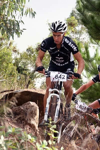 Lewis leads the 80 km race on Stromlo.