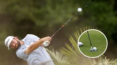 Cameron Young hits a driver, with his putter setting up to a golf ball