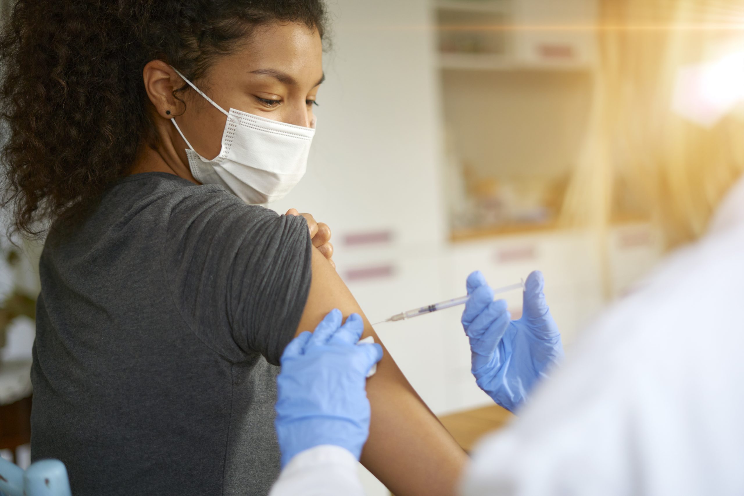 Woman receiving the Covid-19 vaccine