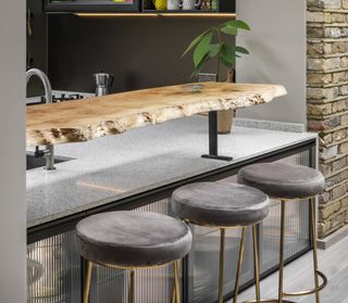 a raw edge timber breakfast bar kitchen idea