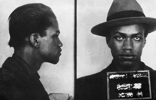 The mugshot taken of Malcolm X after his arrest in 1944.