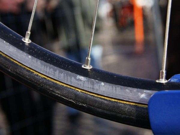They're far from a new idea but the machined sidewalls probably yielded more predictable braking for the Astana riders in today's variable conditions.