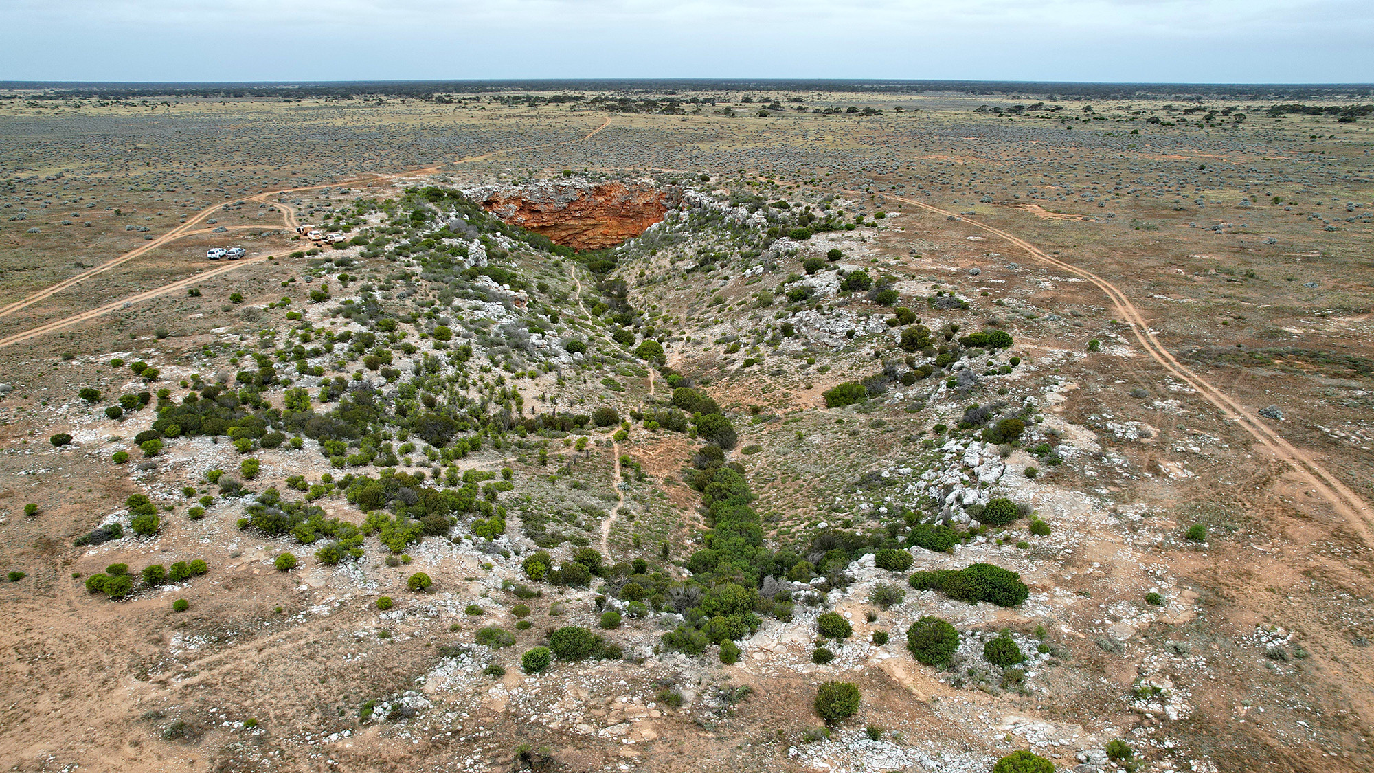 An aerial view of a large trench in the ground