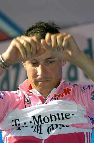 If the jersey fits... Olaf Pollack (T-Mobile) puts on his maglia rosa