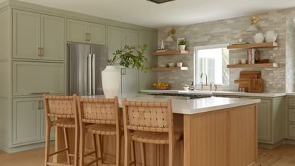 A green and wood kitchen
