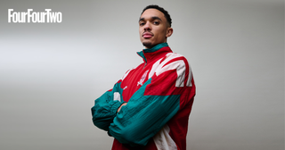 Trent Alexander-Arnold at his cover shoot for FourFourTwo magazine wearing a retro Liverpool FC Adidas tracksuit shell suit from 1994 supplied by Classic Football Shirts