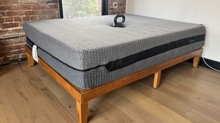 Layla Hybrid mattress with a weight in the centre