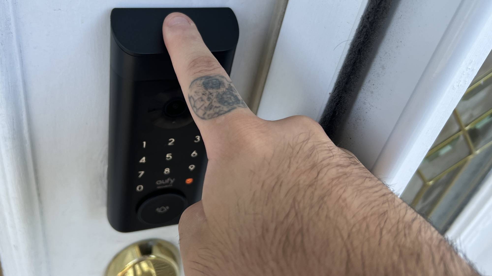 Eufy E330 fingerprint scanner in use