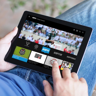 Sling TV interface watching football on a tablet