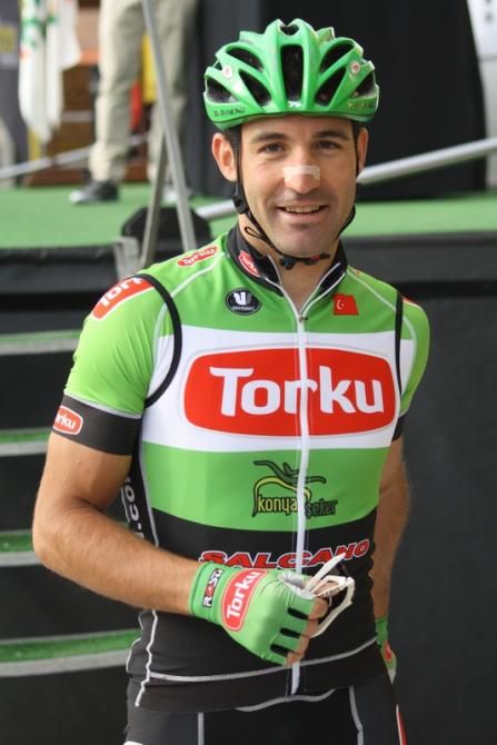 David de la Fuente showcases Torku jersey. His teammate and best friend Juan Jos&eacute; Cobo didn&rsquo;t participate today, as he is preparing for the Tour of Qinghai Lake.