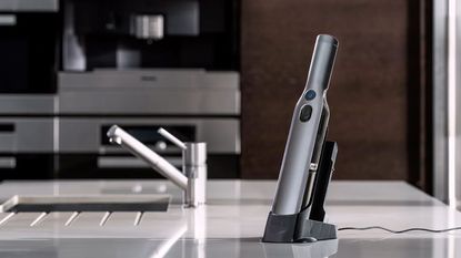 Shark Black Friday deals. Shark wand handheld vacuum on kitchen countertop