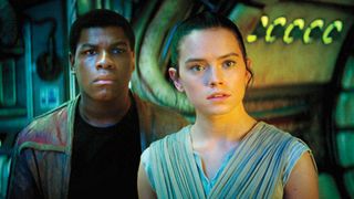 Finn, a former stormtrooper-in-training, and Rey, are two lead characters in the current trilogy of "Star Wars" movies, shown here in "The Force Awakens."