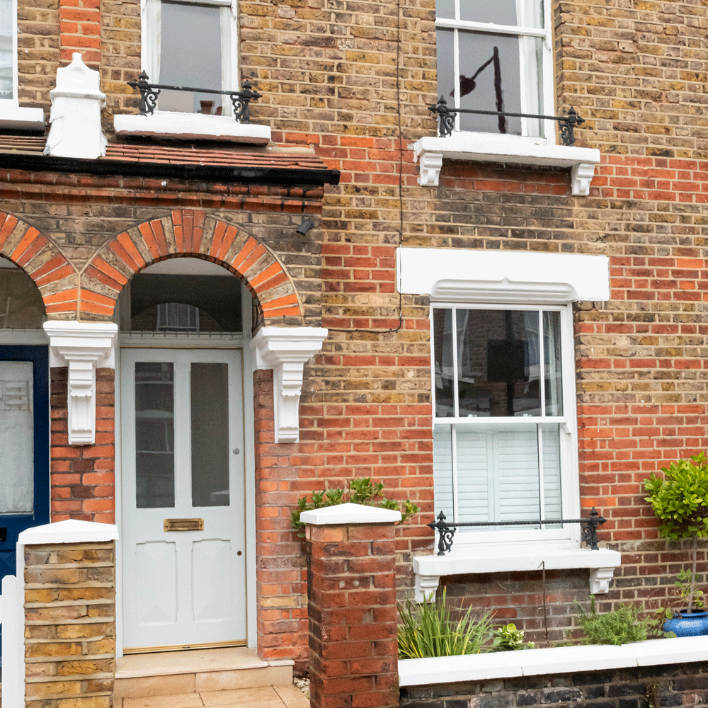 house exterior with brick wall
