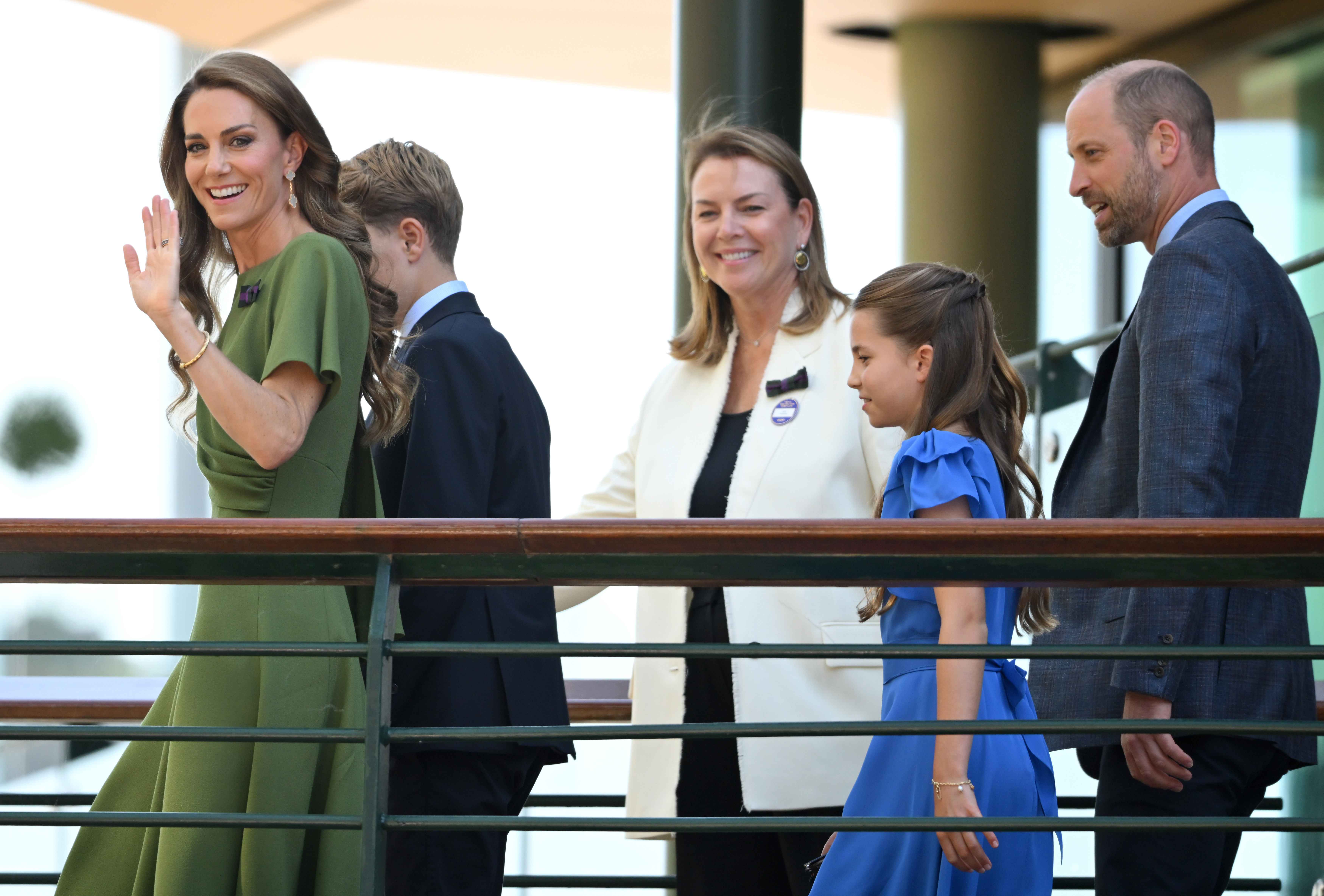 Kate Middleton arrives at Wimbledon 2026 wearing a green dress accompanied by Princess Charlotte and Prince George