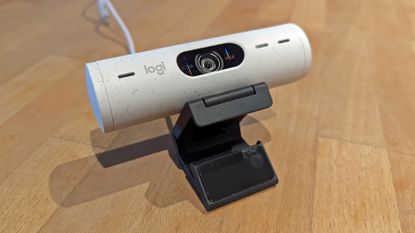 Logitech Brio 500 review: webcam placed on top of computer monitor in a home office