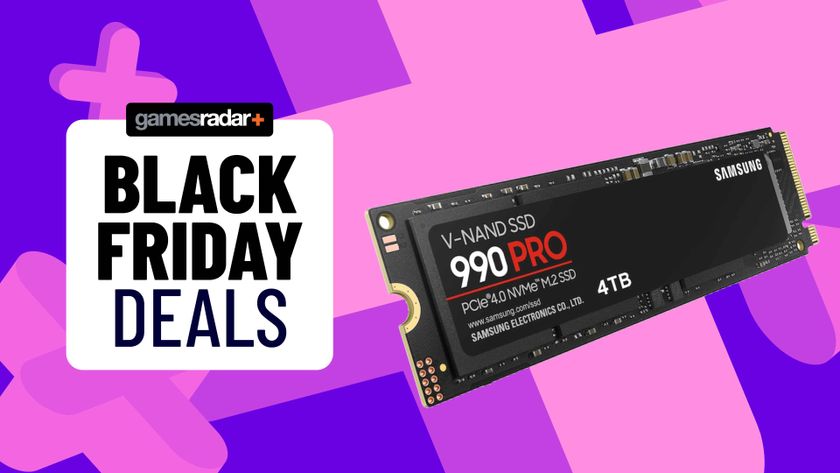 The Samsung 990 Pro SSD next to a sign saying &#039;Black Friday deals&#039;.